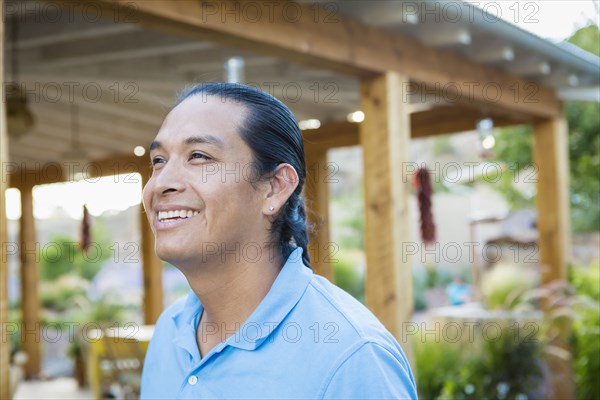 Man smiling outdoors