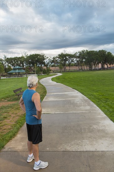 Hispanic man standing in park