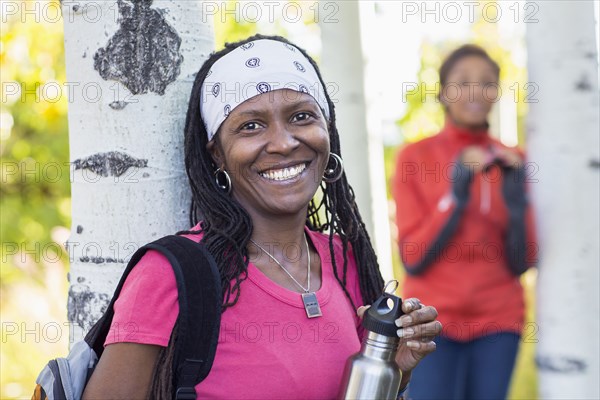 Woman smiling in woods