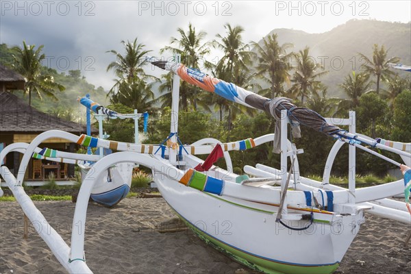 Fishing boats moored on beach