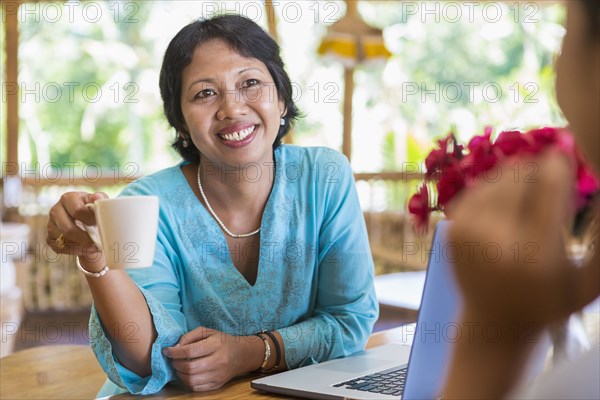 Women having coffee together in cafe