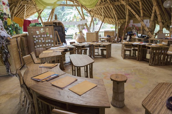 Circular desks in bamboo classroom