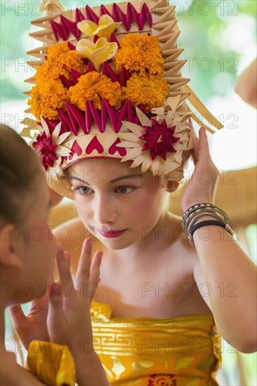 Caucasian girl wearing traditional Balinese clothing