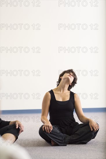 Student stretching in acting class