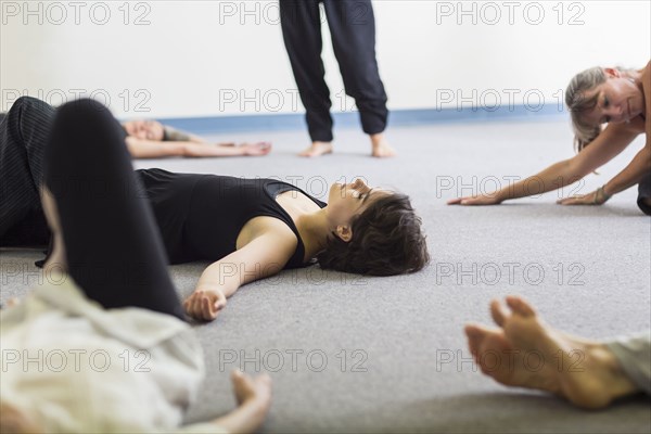 Students stretching in acting class