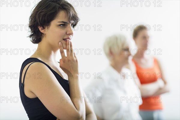 Student listening in acting class