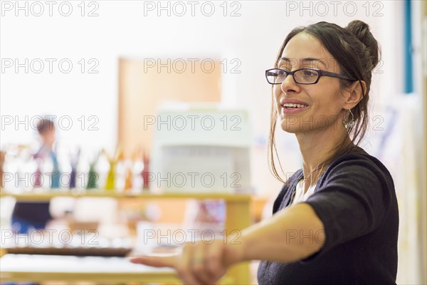 Teacher gesturing in classroom