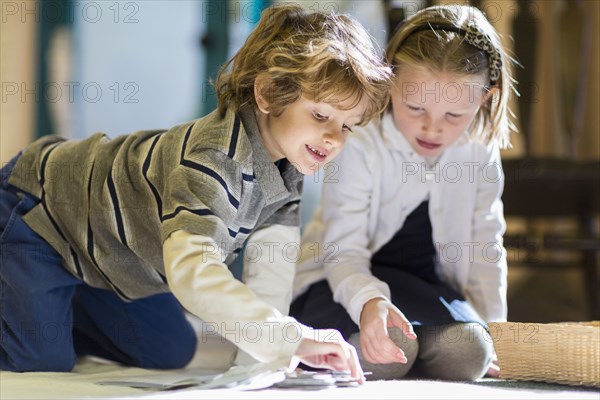 Children working together on floor in classroom