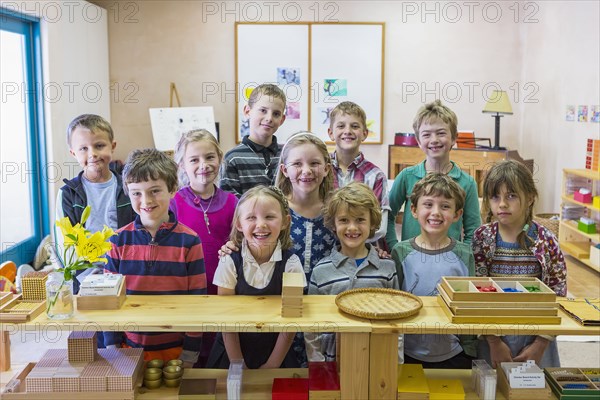 Students smiling together in classroom