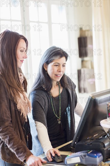 Employees working in clothing store