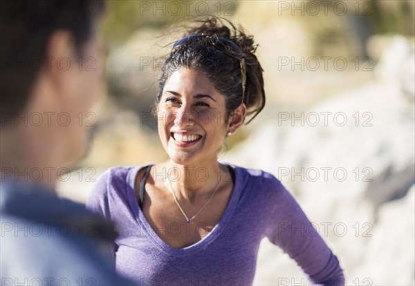 Woman smiling outdoors