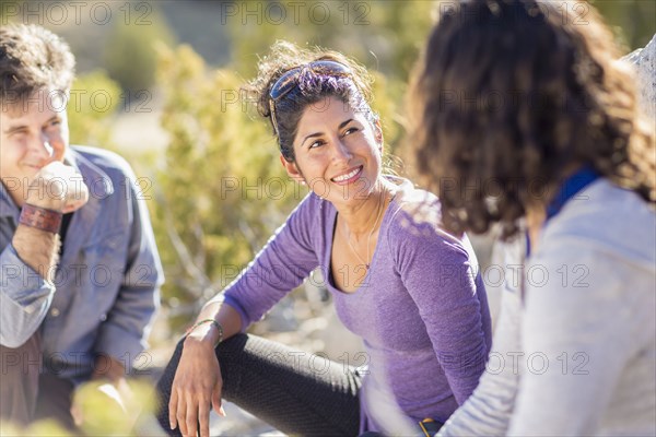 Close up of hikers talking outdoors