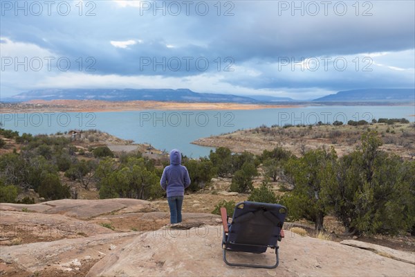 Caucasian  girl admiring scenic view from hilltop