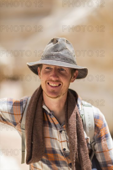 Caucasian hiker wearing sun hat outdoors