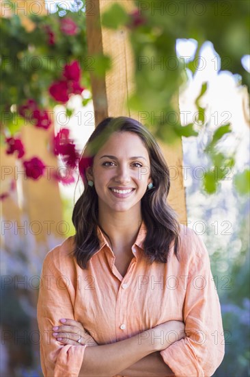 Mixed race woman smiling outdoors