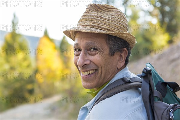 Man exploring autumn forest