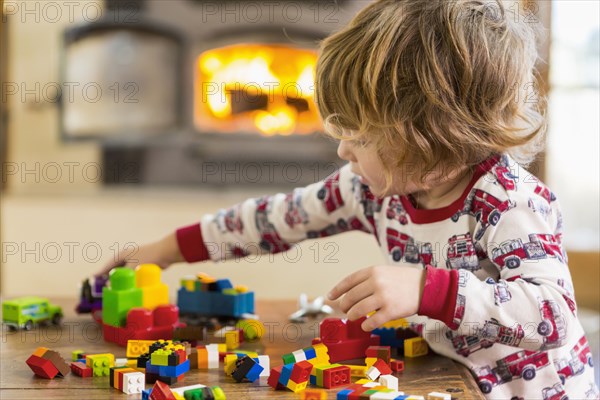 Caucasian boy playing with blocks