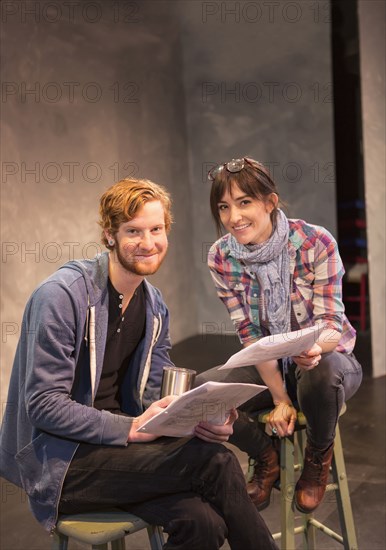 Actors rehearsing on theater stage