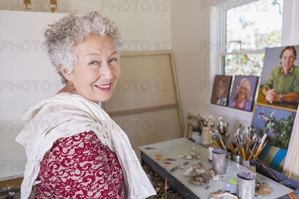 Artist smiling in studio