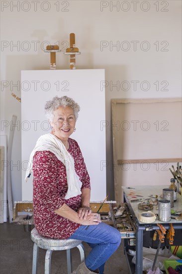 Artist smiling in studio