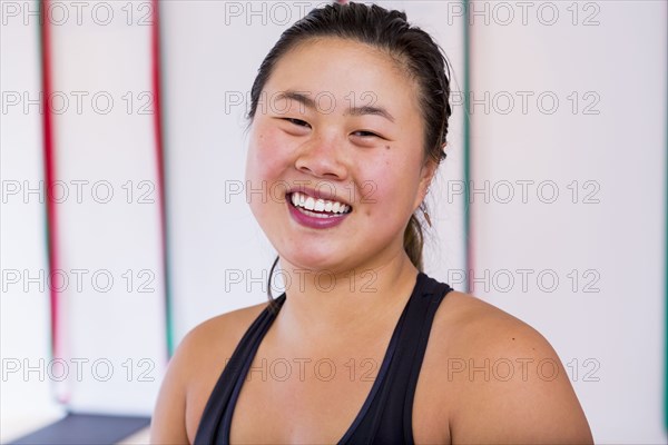 Portrait of smiling Asian woman