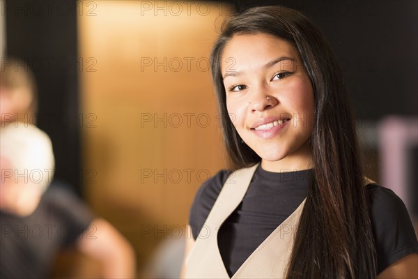 Portrait of smiling Mixed Race teenage girl