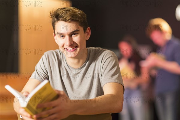 Portrait of smiling Mixed Race teenage boy