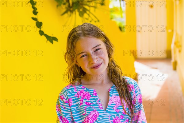 Smiling Caucasian girl with wet hair