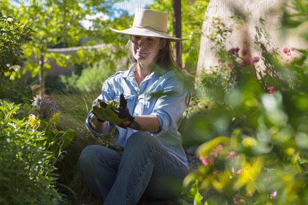 Older Caucasian woman gardening