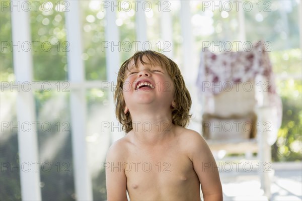 Caucasian boy laughing