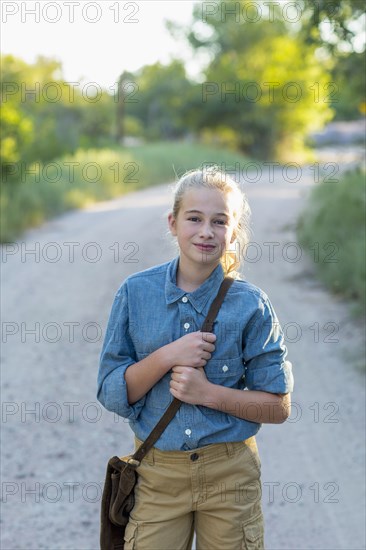 Portrait of confidence Caucasian girl hiking