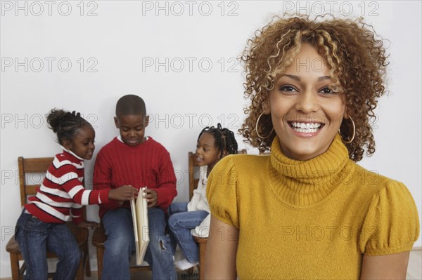 African mother in front of children