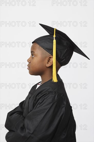 African boy wearing cap and gown