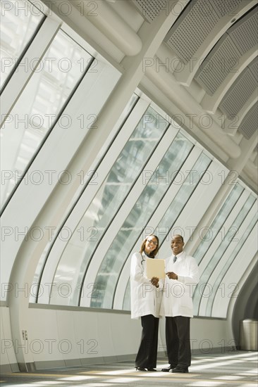 African doctors posing in corridor