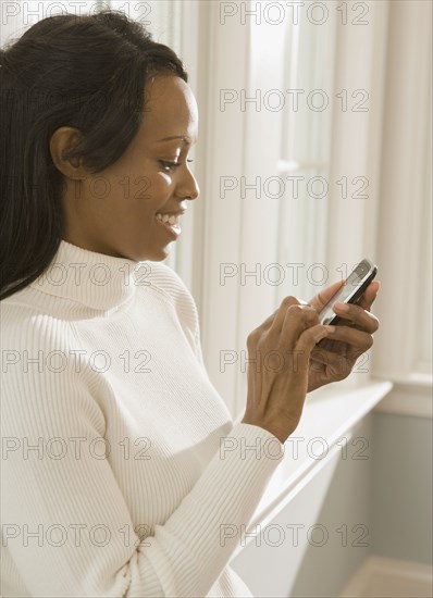 African woman using cell phone