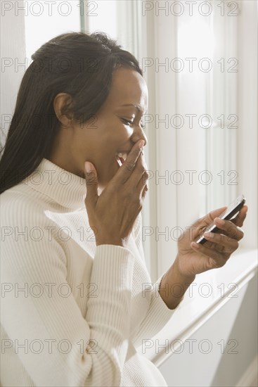African woman using cell phone