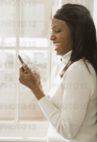 African woman using cell phone