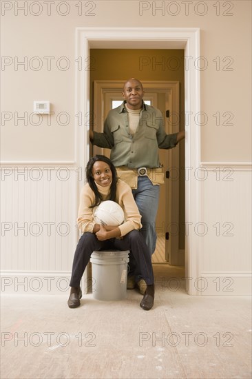 African couple doing home improvement