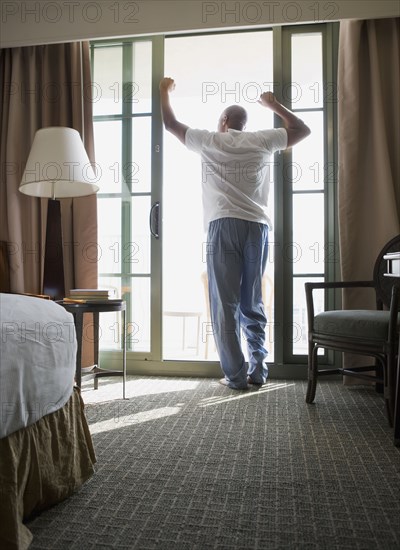 African man wearing pajamas in morning