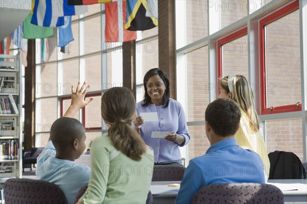 Teacher asking students questions