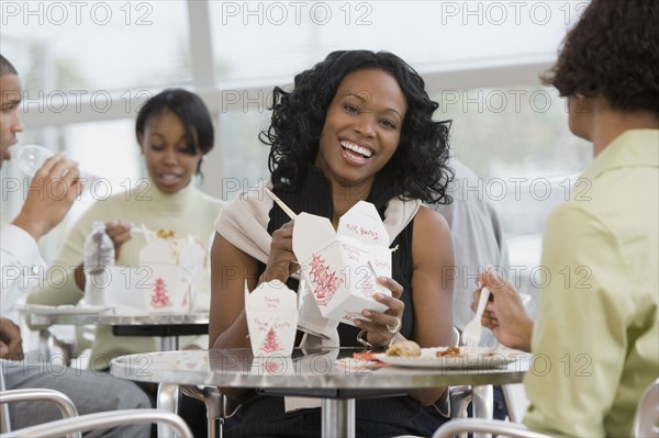 African co-workers eating lunch