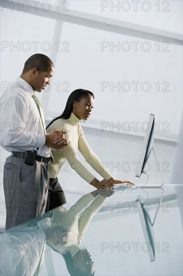 African businesspeople using computer