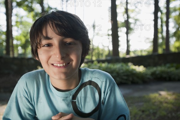 Mixed race boy smiling