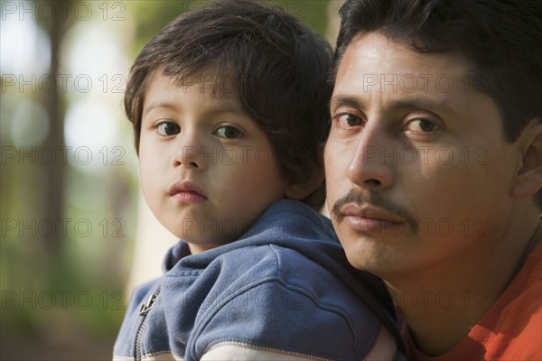 Hispanic father and son