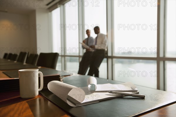 Businessmen meeting in conference room