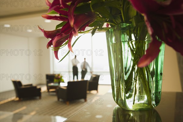 Businessmen having meeting in lobby