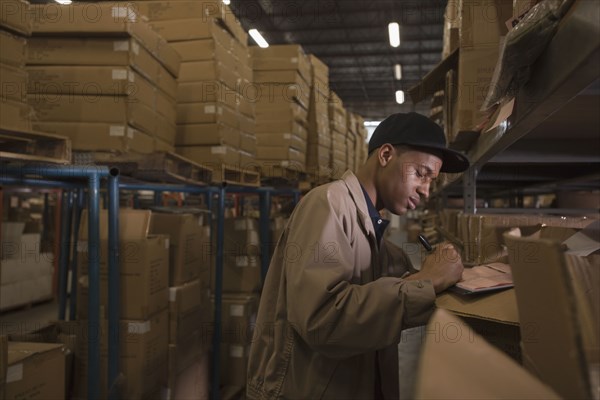 Black man working in warehouse