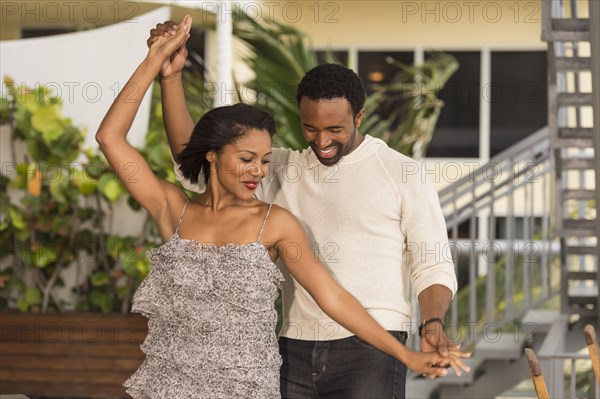 Couple dancing outdoors