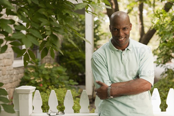 Smiling African American man standing outdoors