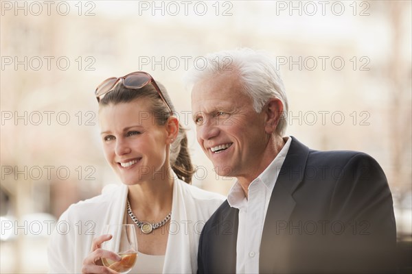 Caucasian couple drinking wine